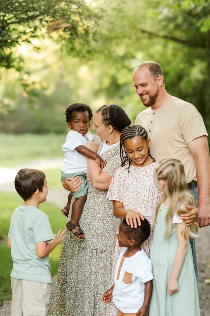 Large family with multiple children during photo session at Mill Creek Preserve in York PA