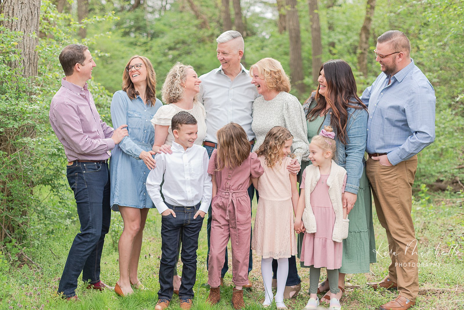 Large family session during spring at john rudy park with spring colored outfits