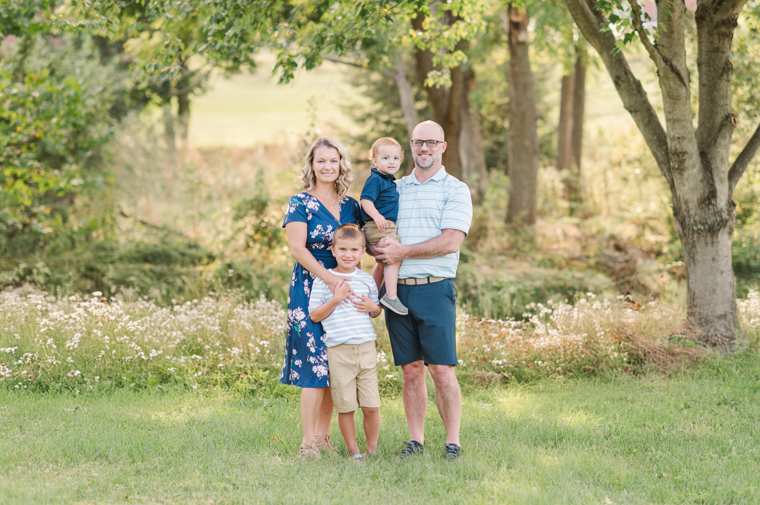 family posing together by best photographer york pa