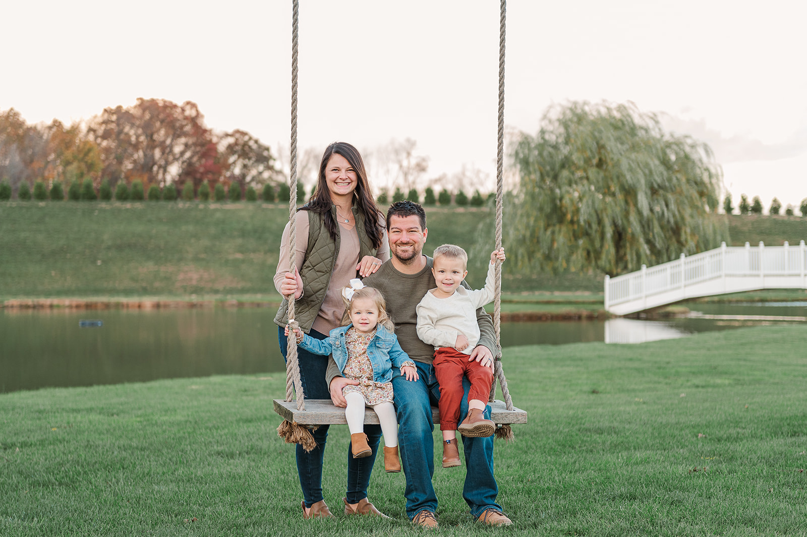 family of four during fall mini session in york pa at spring valley farms by york pa photographer