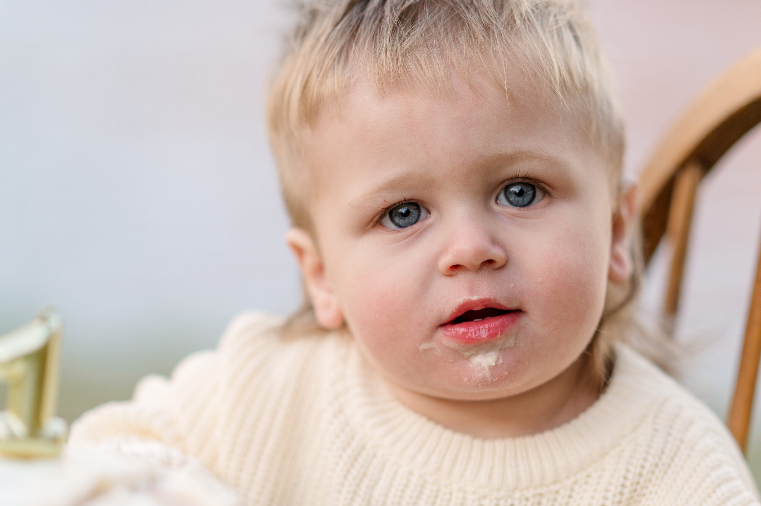A close-up portrait of a one-year-old during his first birthday cake smash at Lake Redman in York PA.