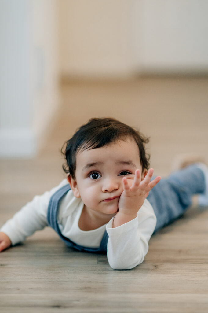 Baby crawling during milestone sitter session in Lancaster PA