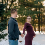 York PA maternity photographer capturing expecting couple at John Rudy Park during golden hour session.