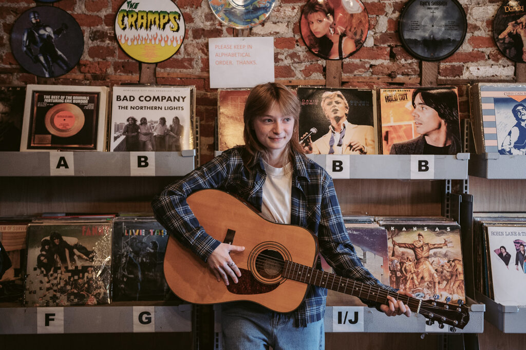 high school senior photo session inside record store in York Pennsylvania