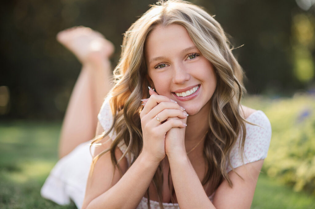 high school senior girl smiling close up during golden hour outdoor session in York PA