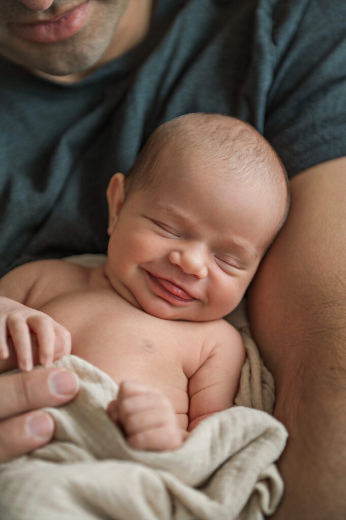 sleeping newborn baby during lifestyle newborn session in York Pennsylvania
