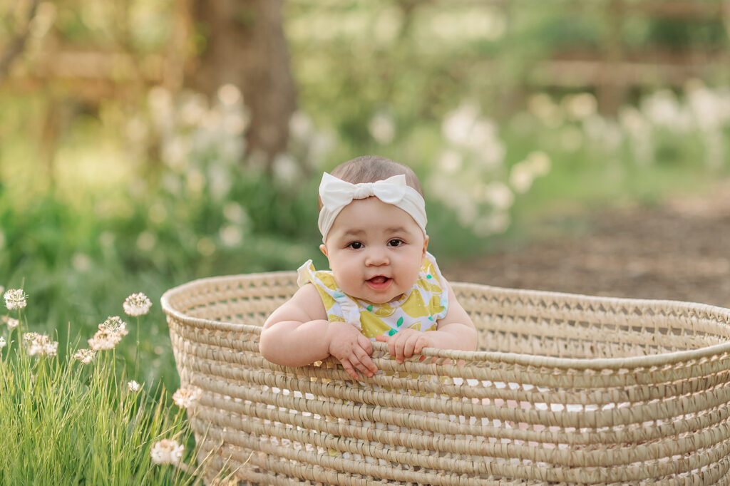 close up of smiling baby during spring mini session with Kara Michelle Photography