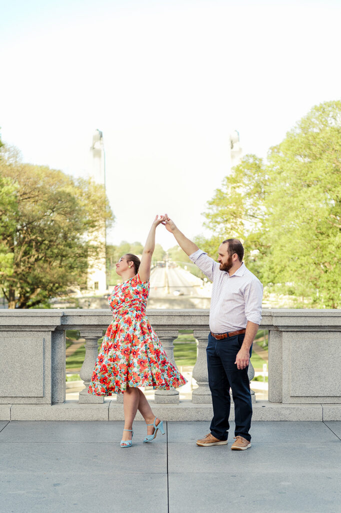 couple dancing during spring photo session at Pennsylvania State Capitol in Harrisburg PA