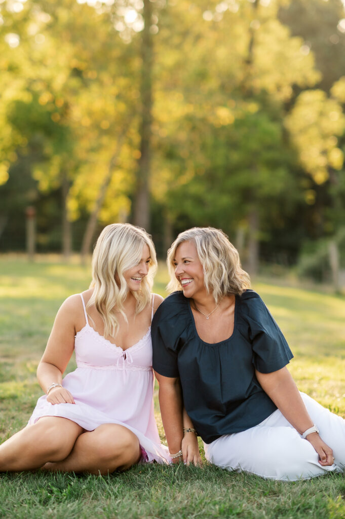 candid mom and daughter photo during senior session